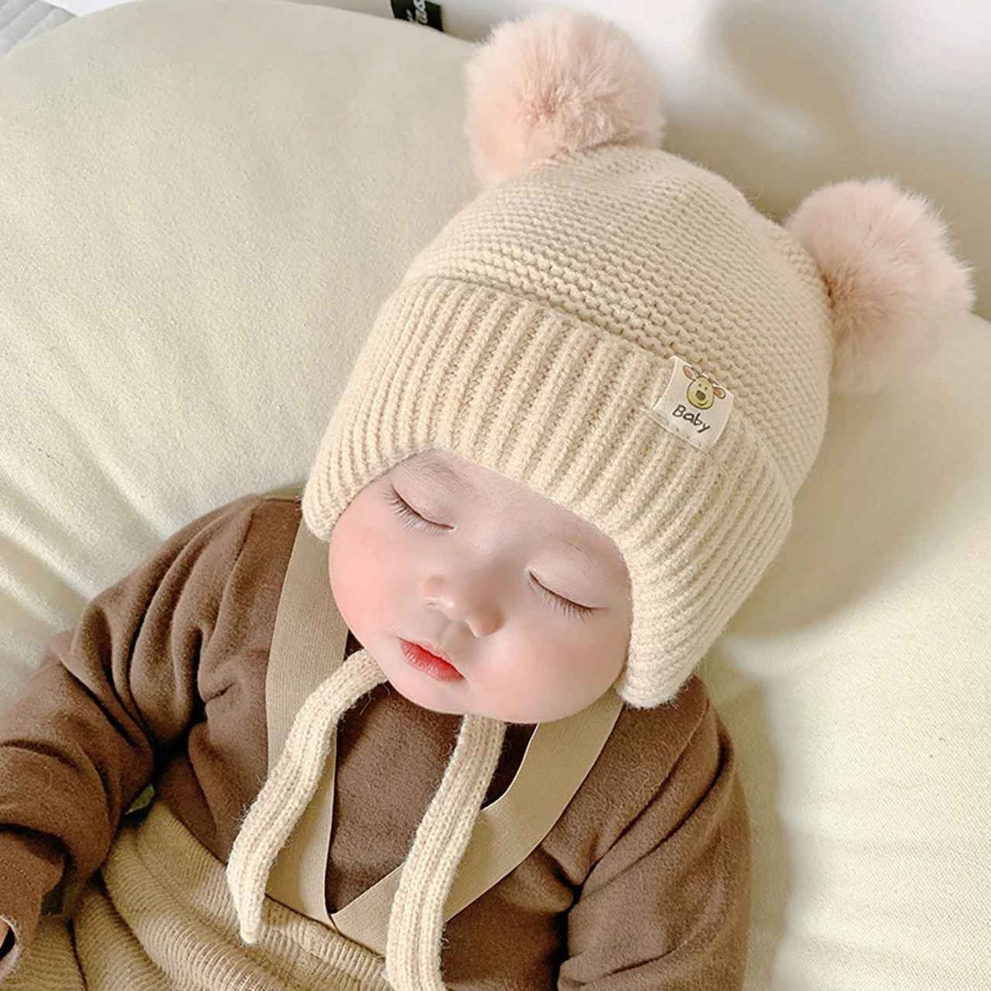 bonnet bebe beige confortable et doux