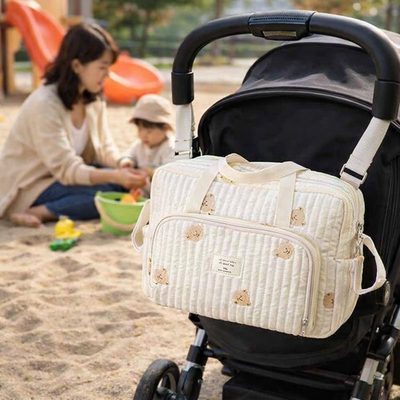 accroche poussette libère mains sac de naissance bébé Le Délicat