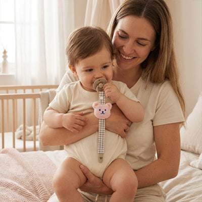 attache tetine Doux Réconfort et jouet sensoriel