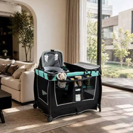 lit voyage bebe Cocoon confort au salon