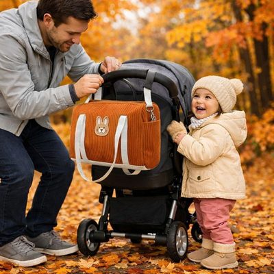 Le départ à l'aventure facile et simple avec notre petit sac a langer qui s'attache à la poussette