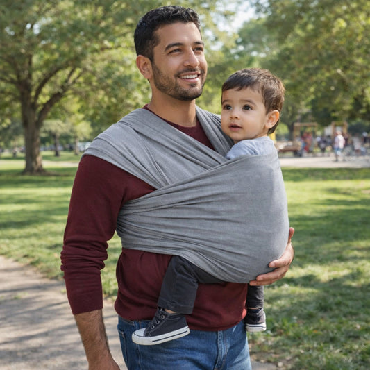 Porter votre enfant pour les promenades sans douleurs avec l'écharpe de portage bébé
