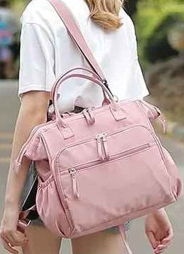 Le sac a dos a langer bebe se porte aussi en version bandoulière avec sangle ajustable