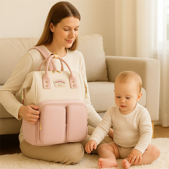 Sac a dos a langer de couleur blanc et rose pour les essentiels de bébé