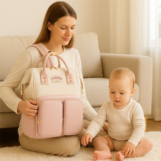 Sac a dos a langer de couleur blanc et rose pour les essentiels de bébé