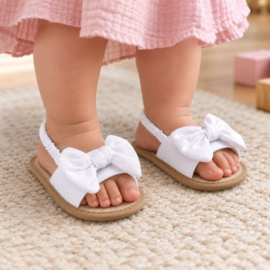 sandales bébé fille Toesy blanches nœud papillon charmant