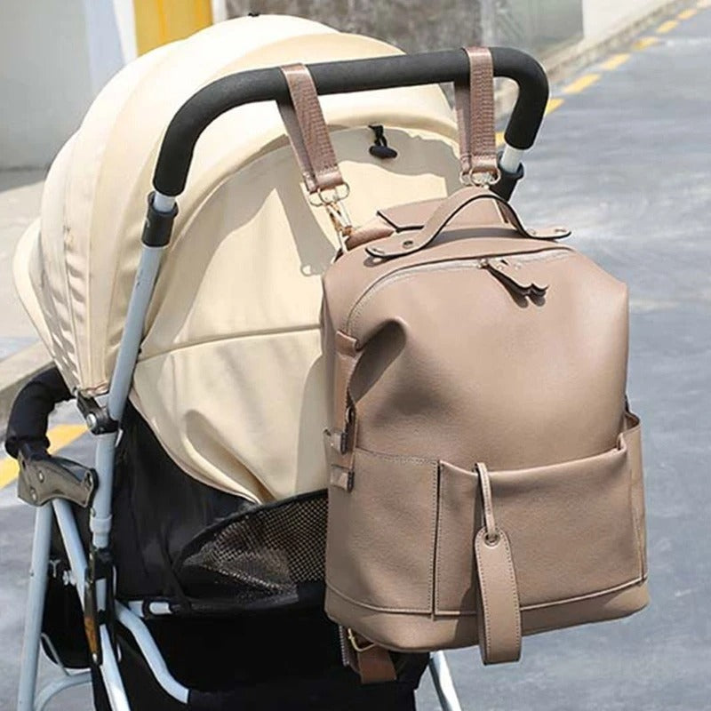 Sac à dos bébé s'accroche facilement à la poussette avec ces sangles incluses avec le sac